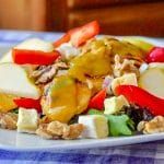 Honey Dijon Chicken Salad with Brie and Walnuts close up photo of prepared salad on a white plate