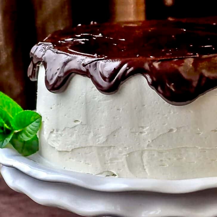 Midnight Mint Chocolate Cake photo of finished cake on white pedestal stand