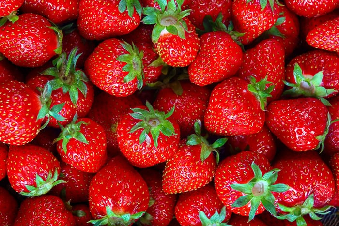 Fresh strawberries close up photo.