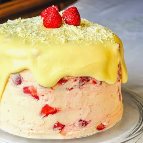 Strawberry White Chocolate Buttercream Cake photo of finished uncut cake