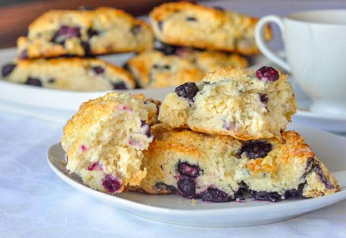 Blueberry Cheesecake Scones broken open to reveal inside.