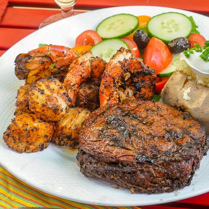 Cajun Spice Rub on Surf and Turf shown with baked potato and salad