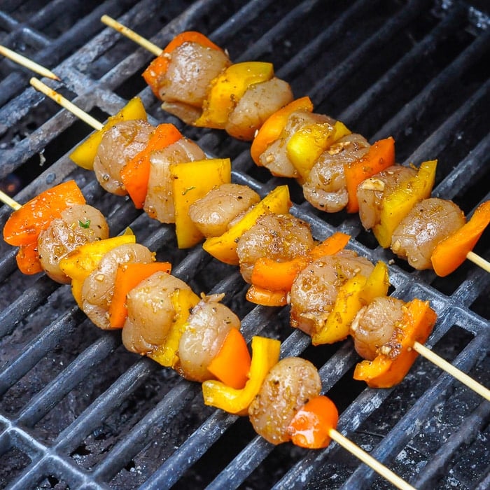 Ginger Soy Grilled Scallops on skewers on a gas grill