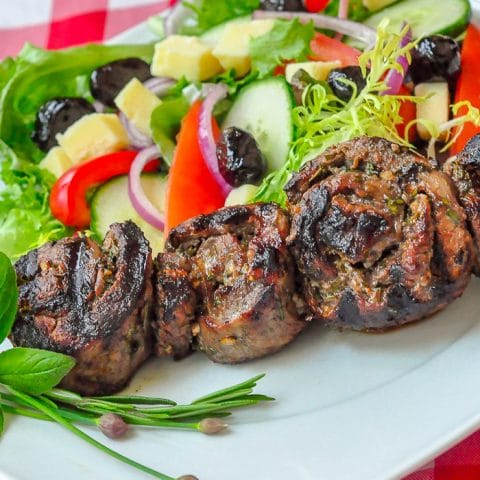 Herb and Garlic Rolled Steak Medallions close up photo