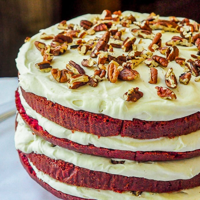 The Best Red Velvet Cake photo of the completed uncut 4 layer cake