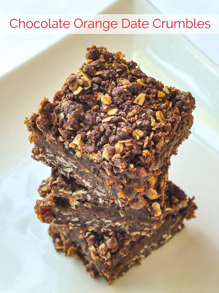 Chocolate Orange Date Crumbles photo of stacked cookie squares with title text added for Pinterest