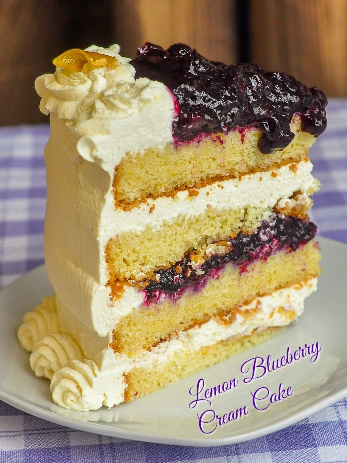 Lemon Blueberry Cream Cake photo of a single slice with title text added for Pinterest