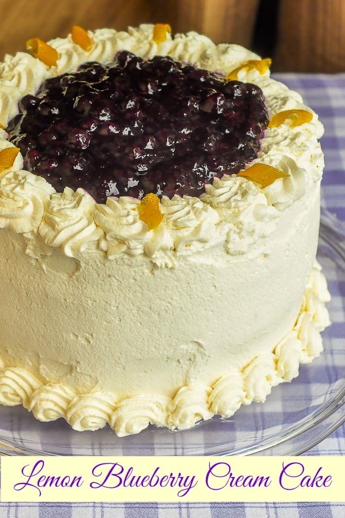 Lemon Blueberry Cream Cake photo of uncut cake with title text added for Pinterest