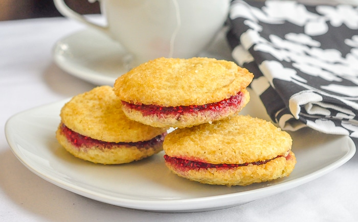 Raspberry Vanilla Butter Cookies wide photo of cookies on a white plate