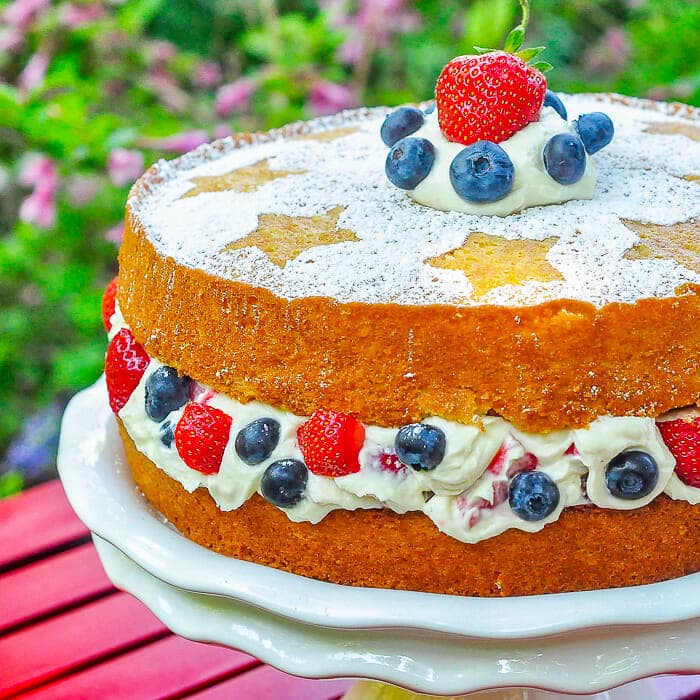 Red White and Blue Mascarpone Cream Cake close up photo