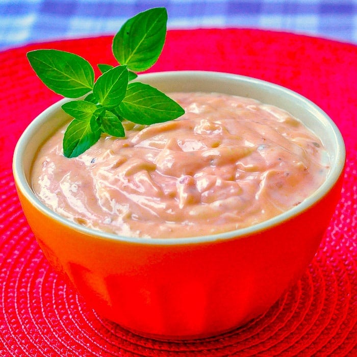 Spicy Sundried Tomato Mayo in orange serving bowl