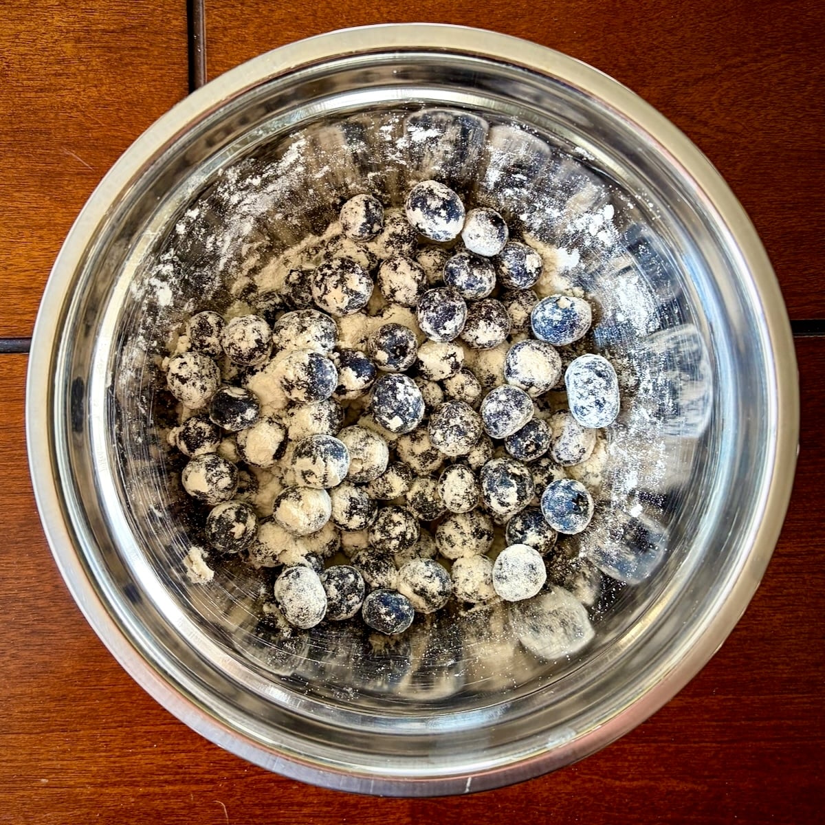 Photo of blueberries tossed and flour