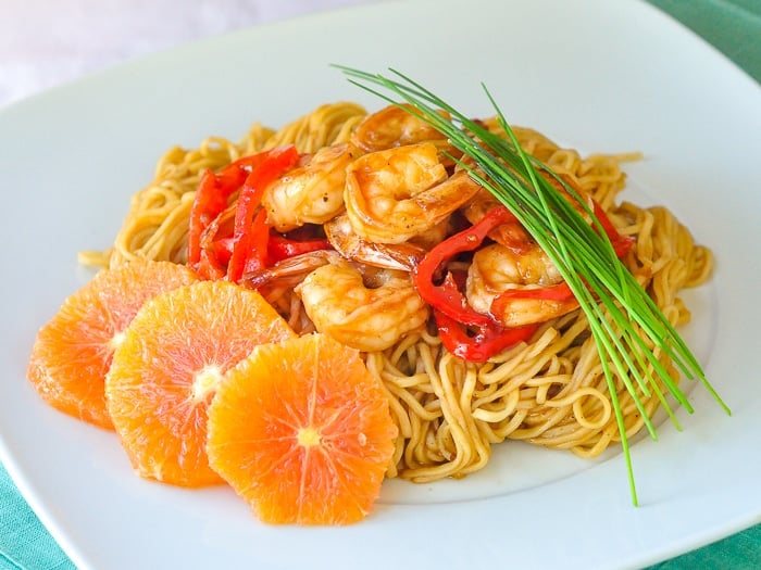 15 Minute Orange Hoisin Shrimp & Noodles wide shot photo of single serving on a white plate