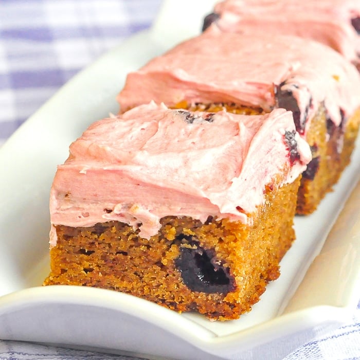 Cherry Cream Cheese Blondies photo of blondies on a rectangular serving plate