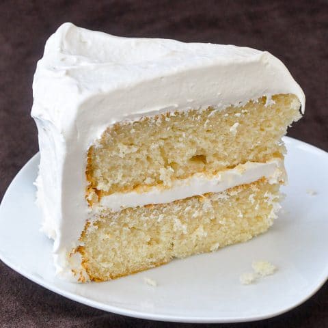 White Velvet Cake photo of a single slice on a white plate