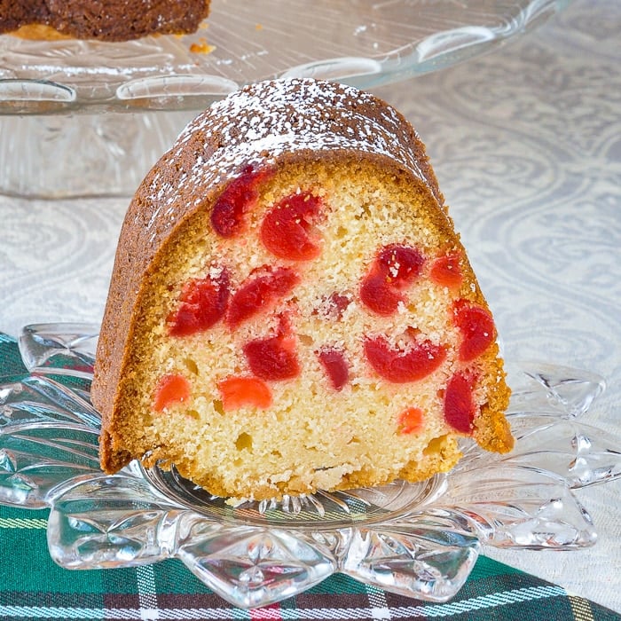Close up photo of a slice of Newfoundland cherry cake baked in a bundt pan