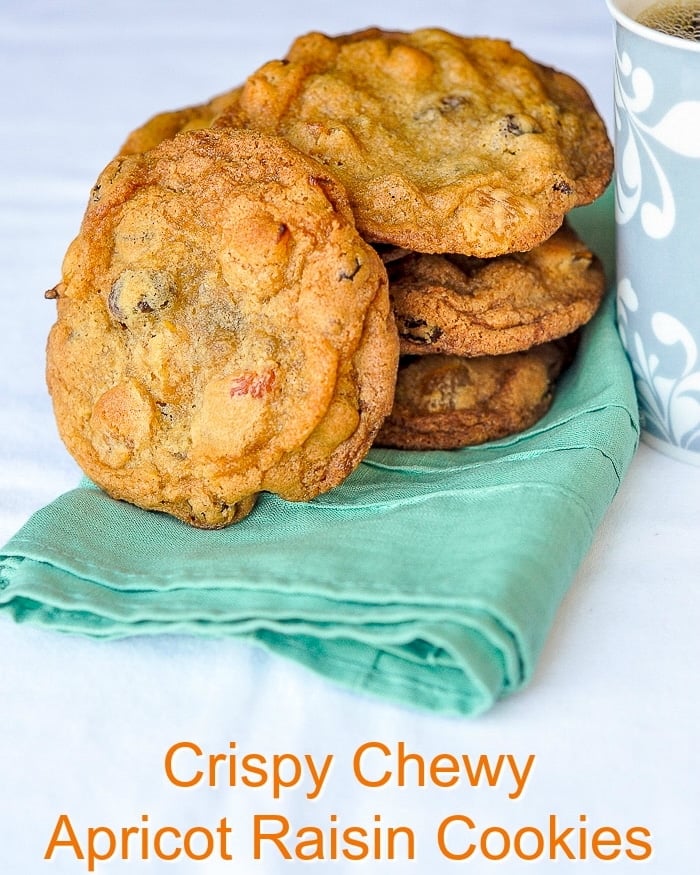 Crispy Chewy Apricot Raisin Cookies close up photo of cookies with title text added for Facebook and instagram