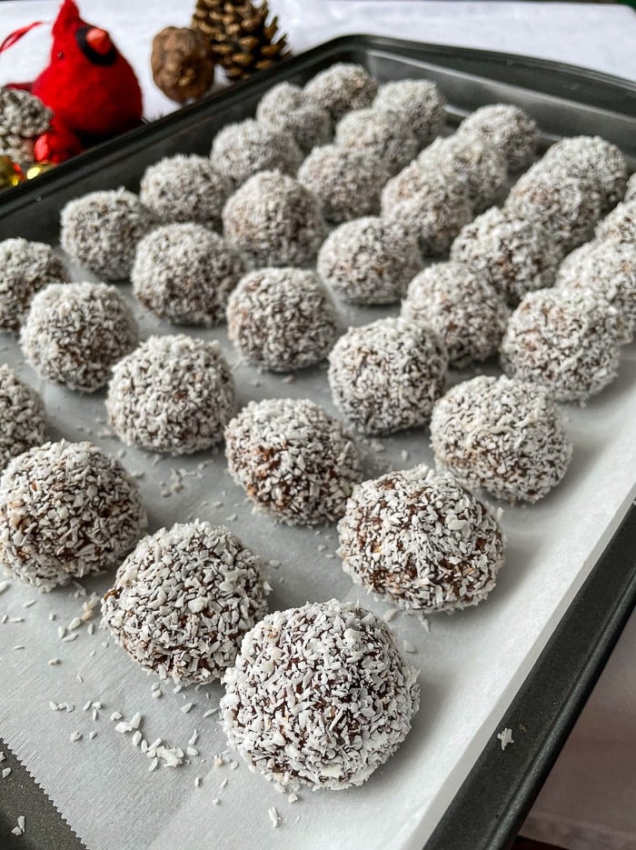 Newfoundland Snowballs on a parchment lined cookie sheet