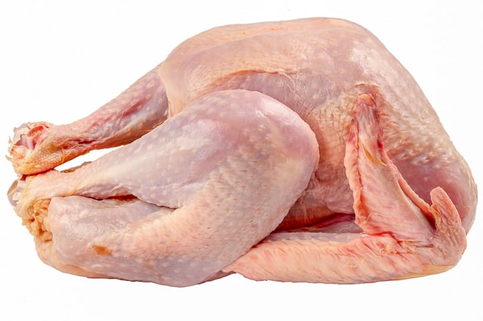 Raw turkey bulk isolated over white background, stock photo
