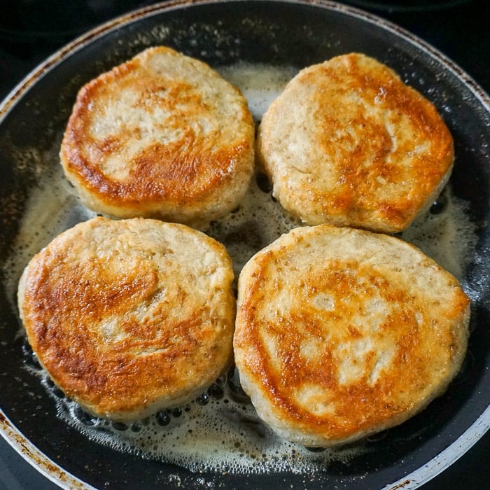 Whole wheat toutons being fried.