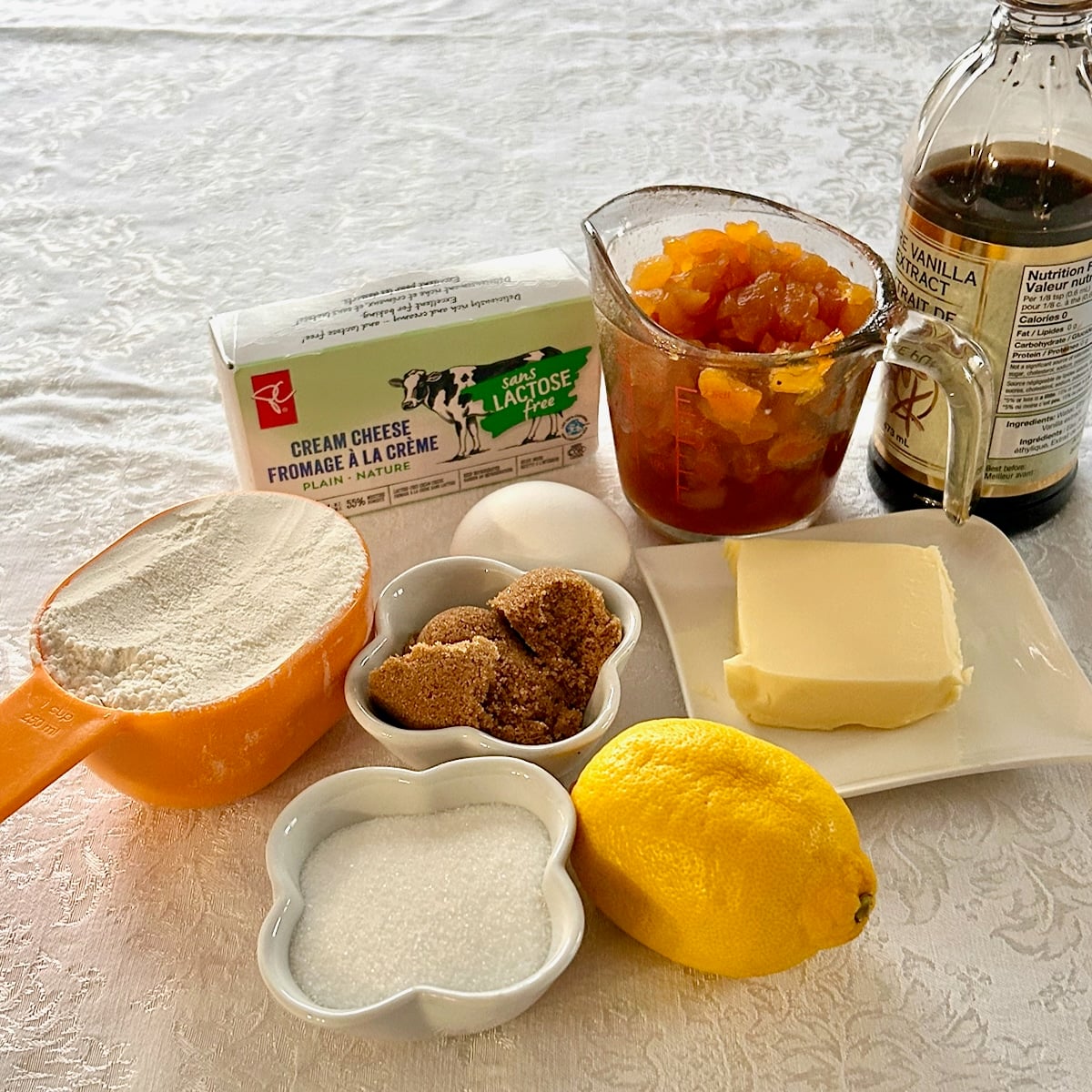 Photp of the ingredients for Apricot Amaretto Cheesecake Bars.
