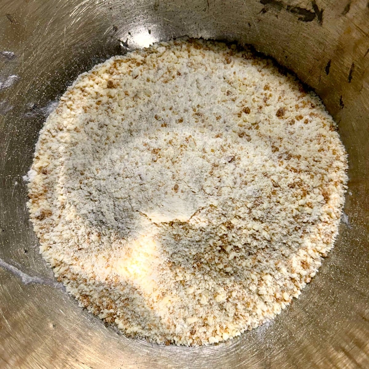 Photo of a bowl of Shortbread crumbs a after processing.