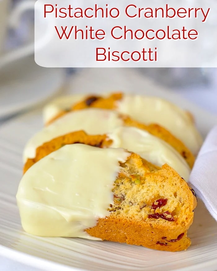 Pistachio Cranberry White Chocolate Biscotti image with title text for social media.