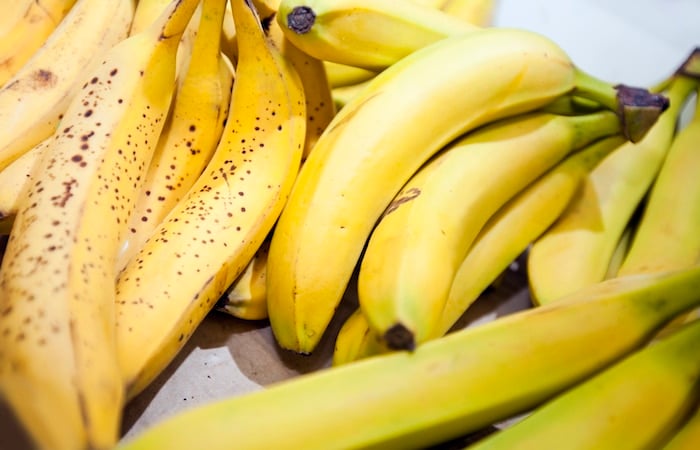 Close-up of bananas fresh and flecked brown to be used in this Honey Cake recipe