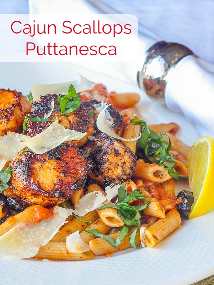 Cajun Scallops Puttanesca photo with title text for Pinterest