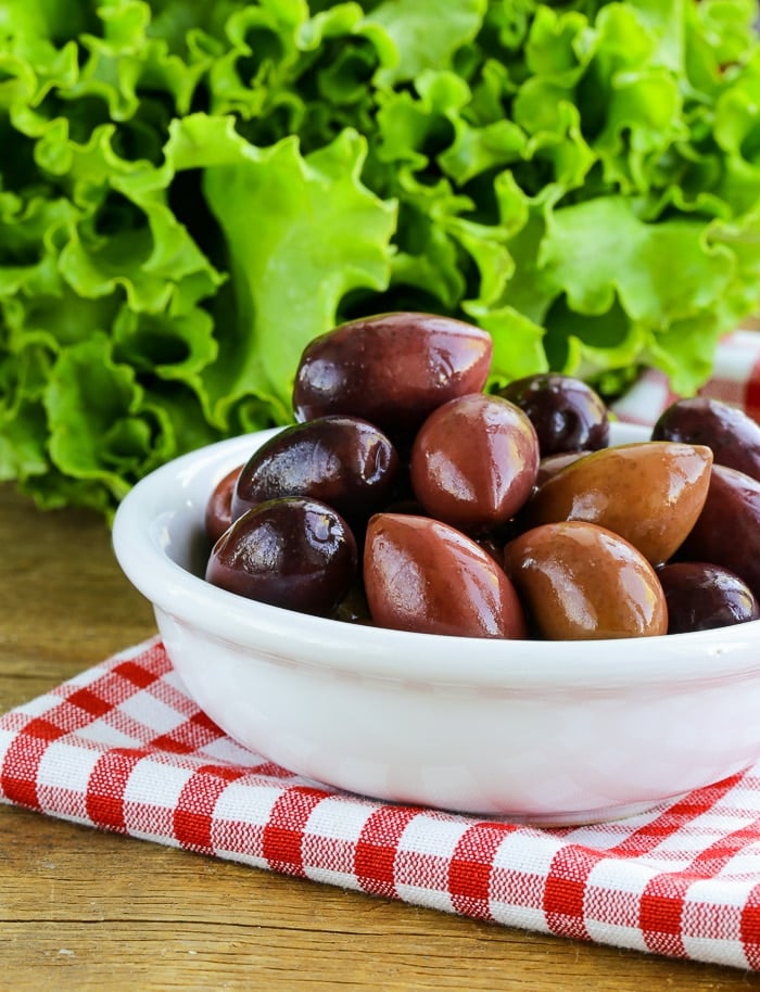 Kalamata Olives in a white bowl.