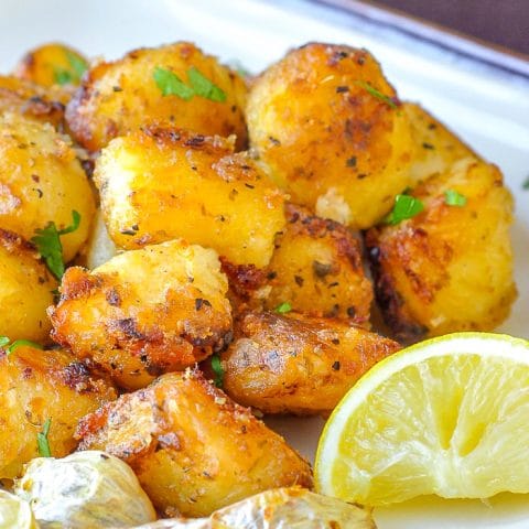 Lemon Herb Roasted Potatoes close up shot with title text for Pinterest