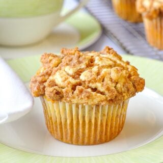 Close up photo of Pumpkin Cream Cheese Walnut Streusel Muffins