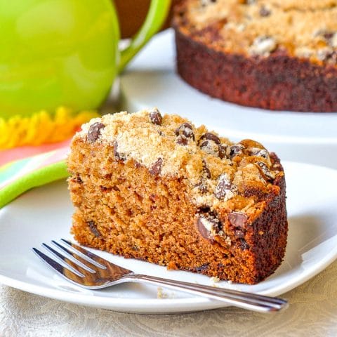 Date Coffee Cake with Chocolate Chip Streusel photo of single slice on a white plate