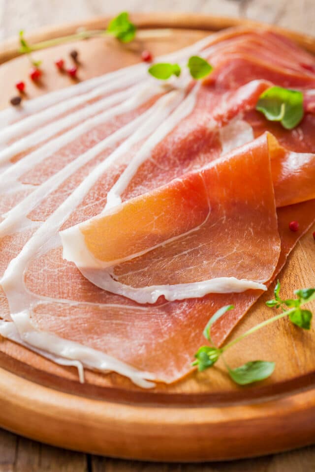 Prosciutto Wrapped Chicken Breasts w/ red pepper & mozza!