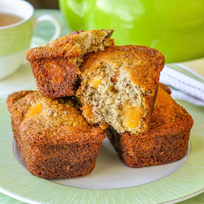 Apricot Pecan Banana Crinkle Cakes close up of a crinkle cake broken open to reveal iside