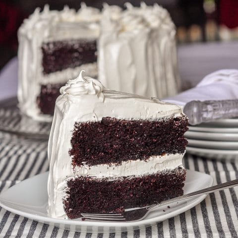 Black and White Cake photo of single slice on white plate