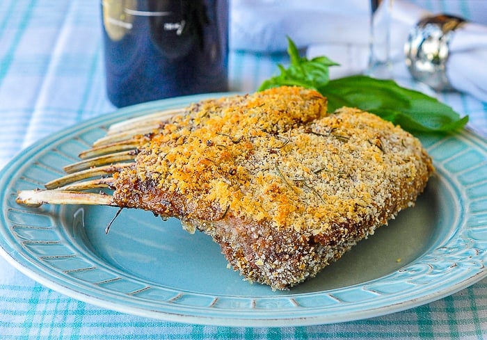 Parmesan Panko Crusted Rack of Lamb photo of completely cooked uncut rack of lamb