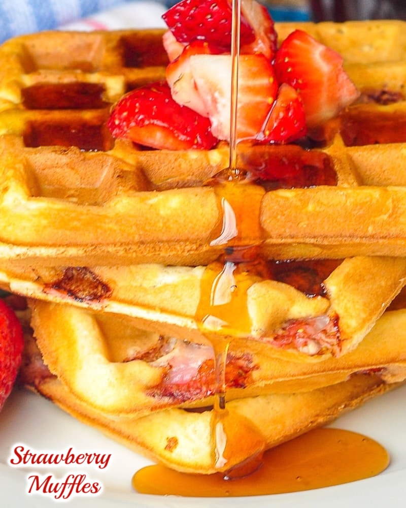 Strawberry Muffles close up photo of maple syrup being poured over them with title text added for social media posts