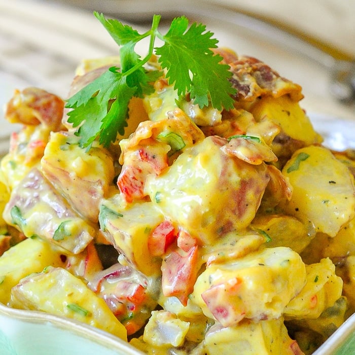 Bacon Potato Salad with Sweet Mustard Dressing close up photo of salad in a serving bowl