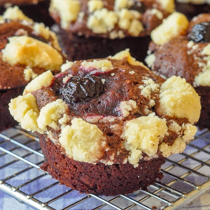 Double Chocolate Cherry Crumble Muffins close up photo of a single muffin