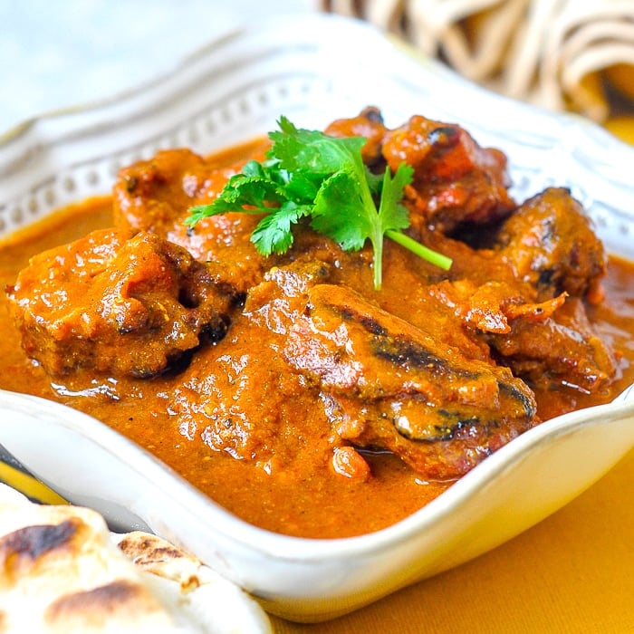 Low Fat Tomato Tandoori Chicken Curry. close up featured square image