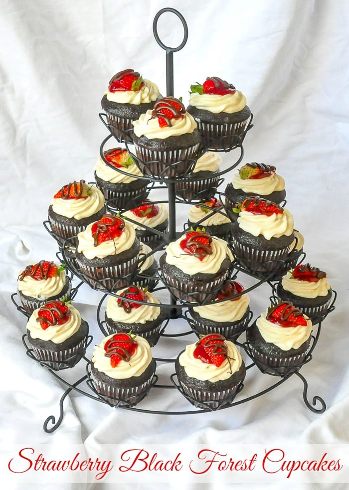 Strawberry Black Forest Cupcakes on a cupcake stand with title text added for Pinterest