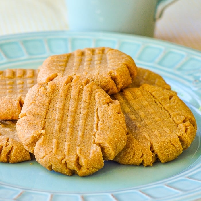 3 Ingredient Gluten Free Peanut Butter Cookies on a teal coloured plate