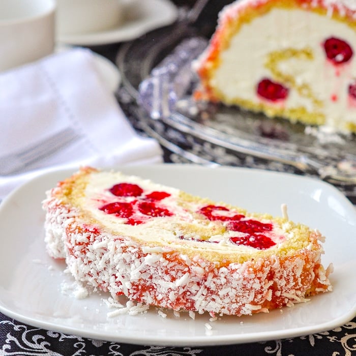 Billot Log Cake photo of a single slice on a white plate