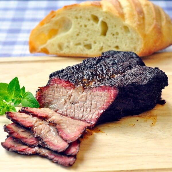 Smoked beef brisket sliced after resting.