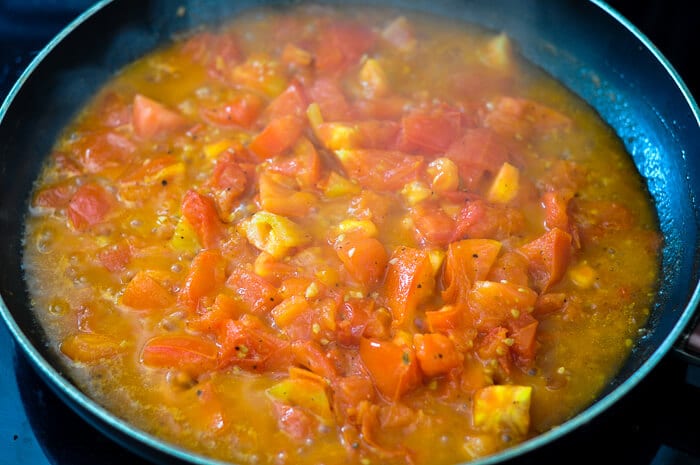 Photo of fresh tomato sauce simmering for grilled pizza.