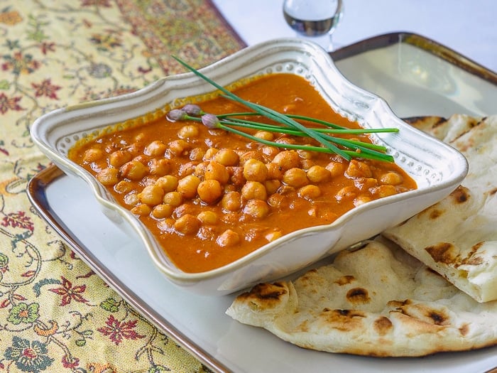 Easy Coconut Chick Pea Korma shown with naan