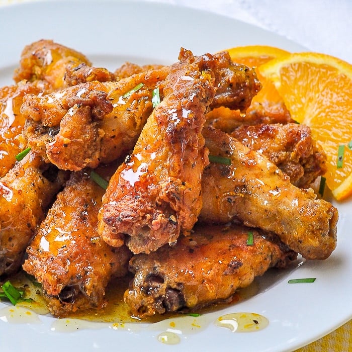 Baked Southern Fried Chicken Wings with Orange Honey Drizzle close up shot