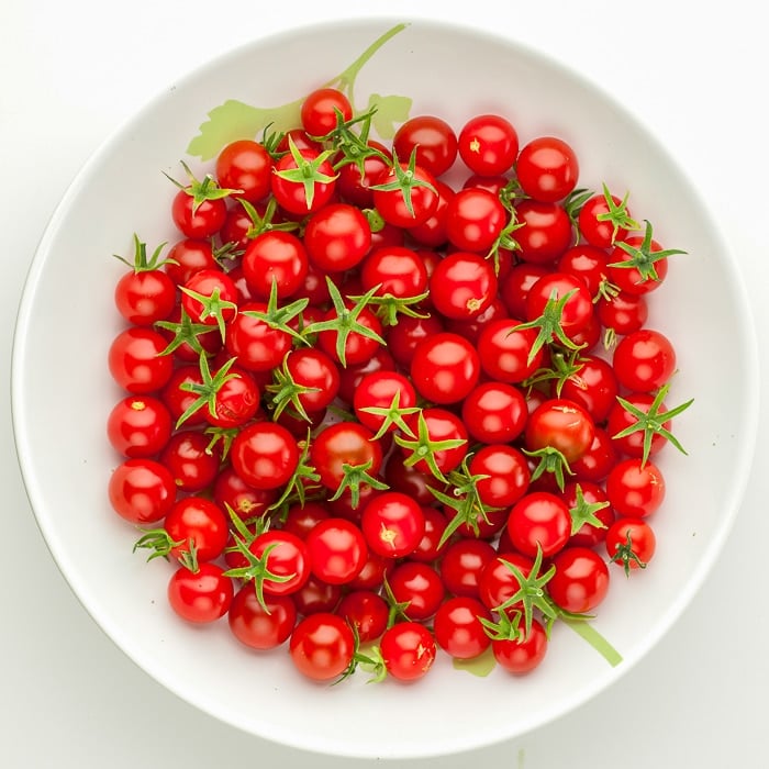 Photo of cherry tomatoes in a white bowl