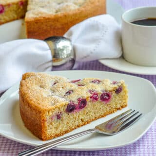 Sunken Grape Almond Cake single slice on white plate